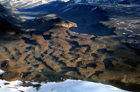 The Laybrinth, Upper Wright Valley, Antarctic Dry Valleys in East Antarctica. Deep (>100 m) channels incised into hard bedrock by the action of massive outburst flooding from one or more subglacial lakes. . Courtesy, David Sugden and George Denton.